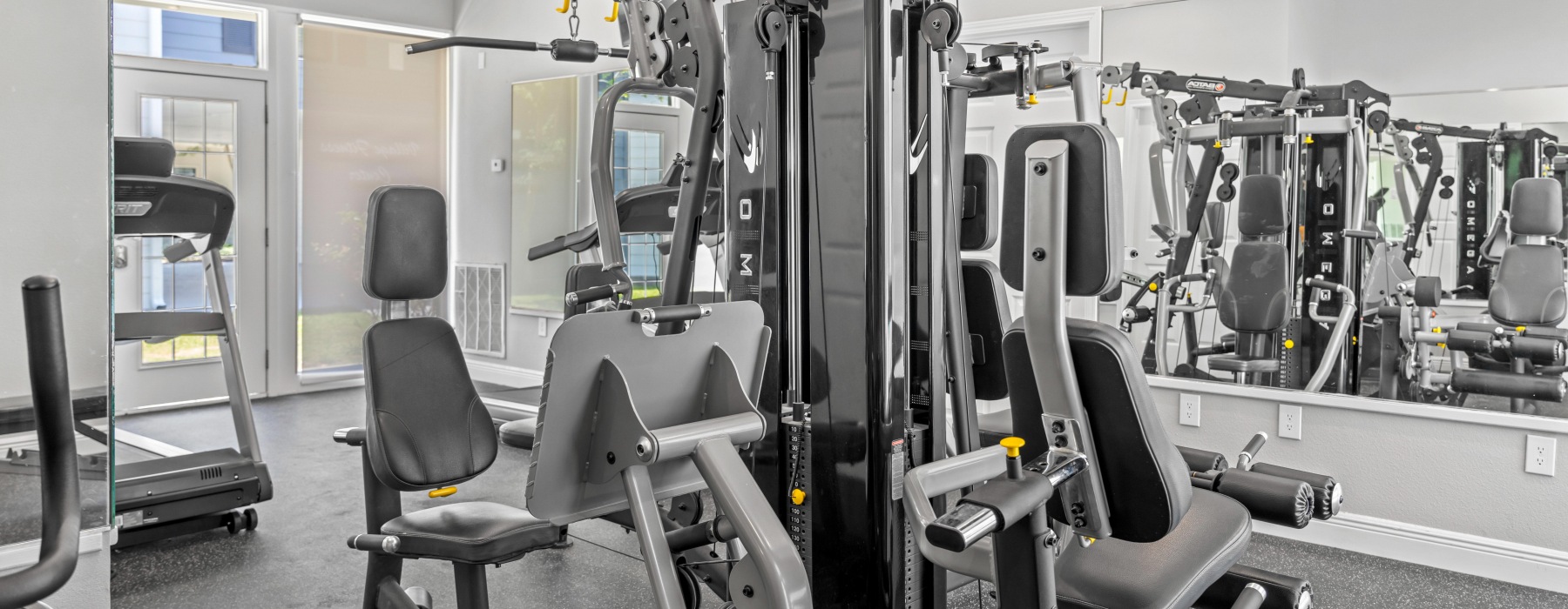 Fully equipped fitness center with weight training and cardio. 